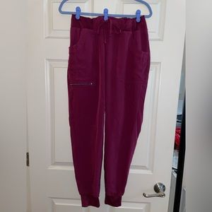Maroon woman’s scrub pants